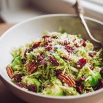shaved brussels sprouts salad with cranberries and pecans